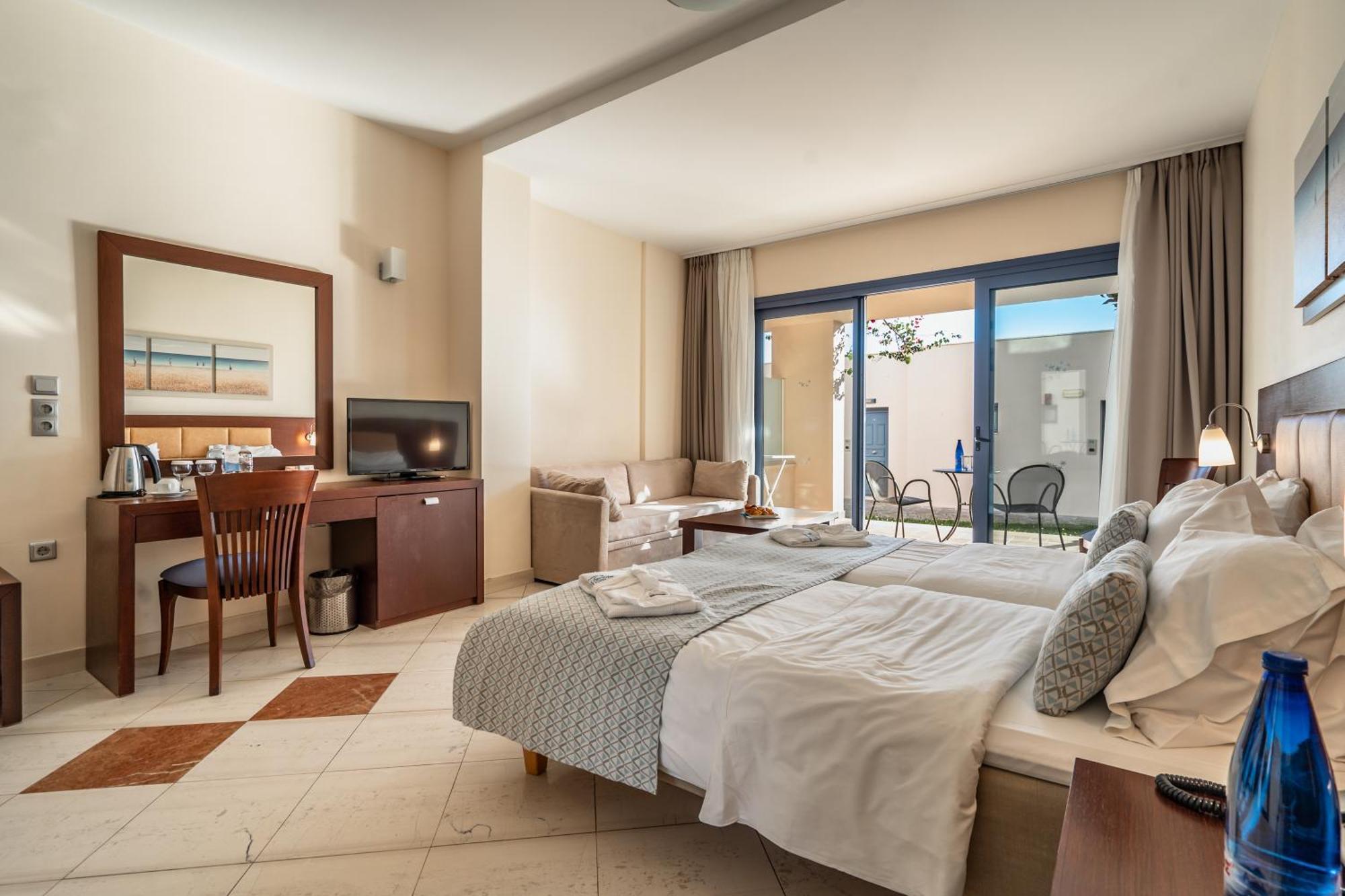 Porto Galini Seaside Resort & Spa نِكيانا المظهر الخارجي الصورة A typical hotel room