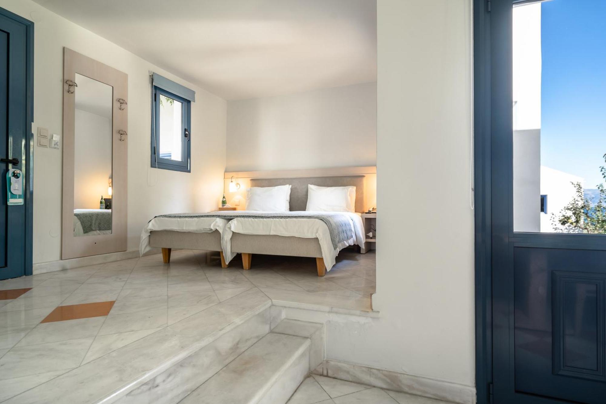 Porto Galini Seaside Resort & Spa نِكيانا المظهر الخارجي الصورة A bedroom at the hotel